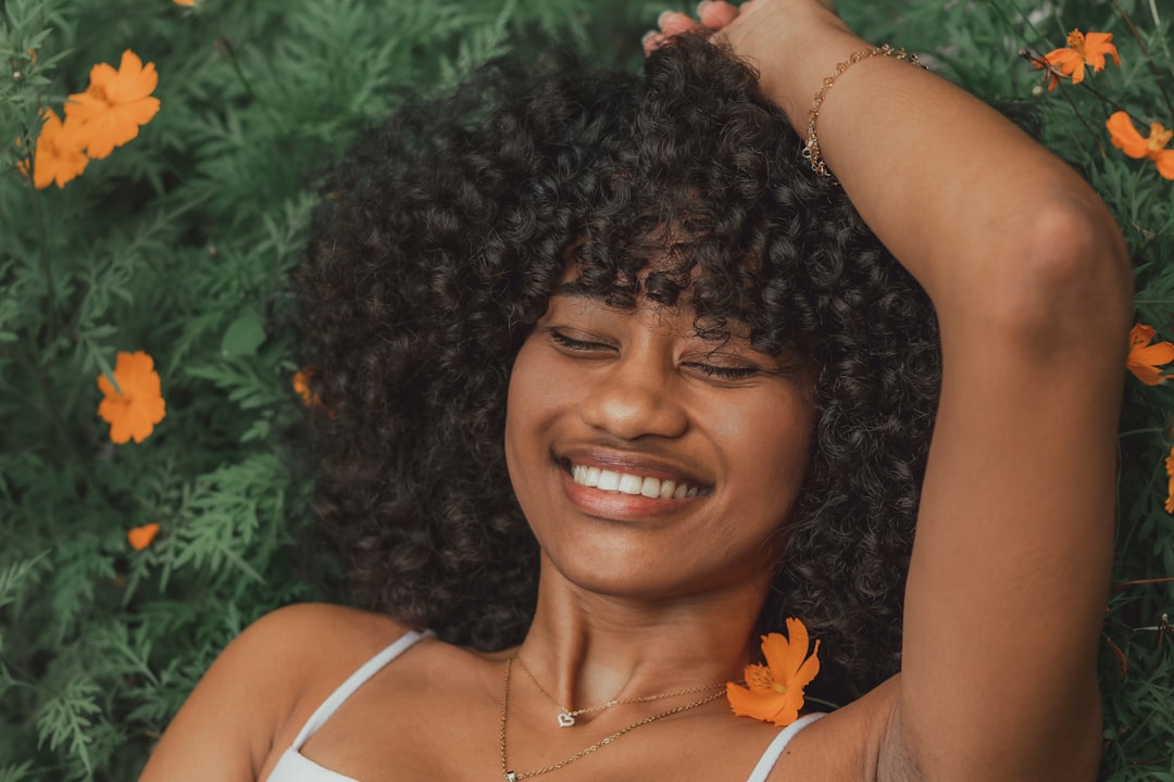 Woman with curly hair smiling