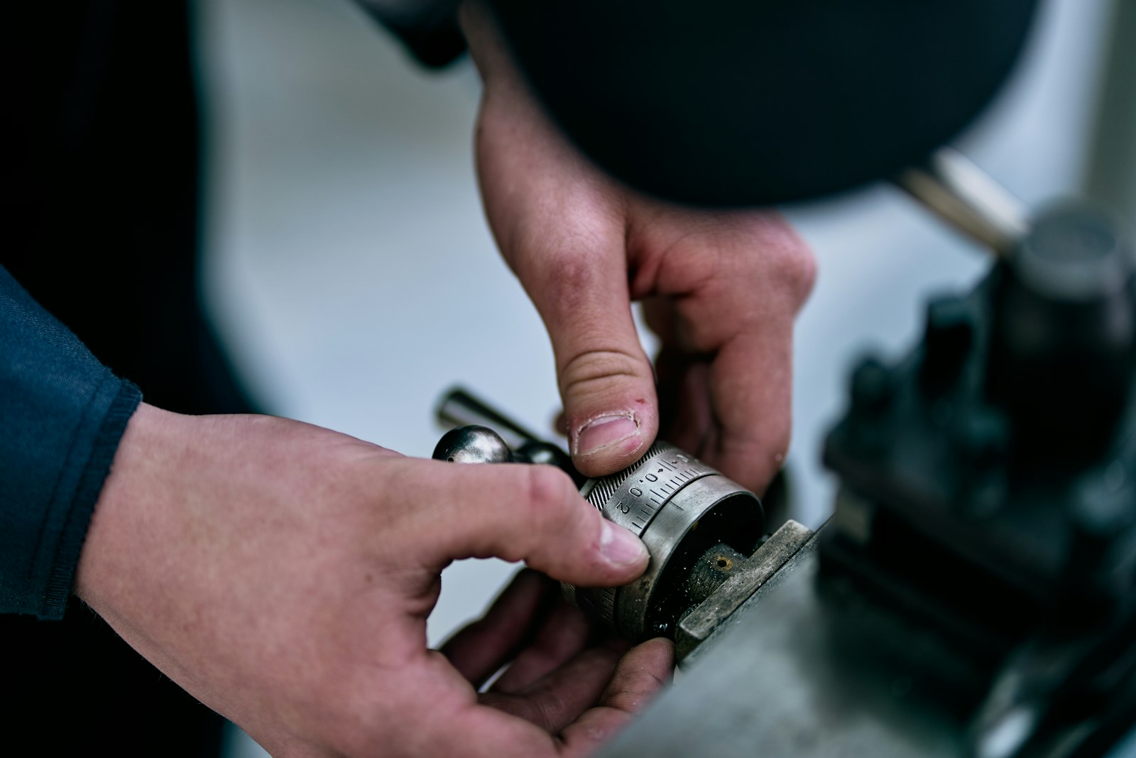 Technician actively repairing equipment with professional hand tools